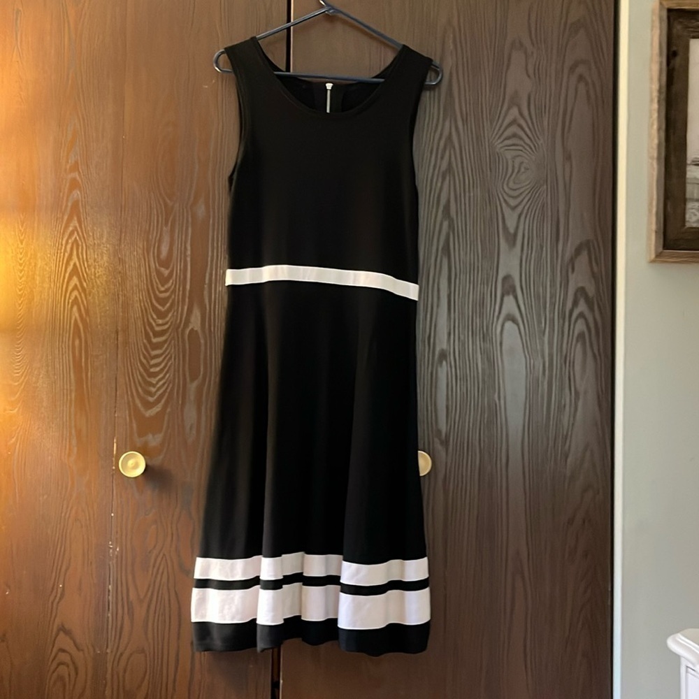 Brand Removed sleeveless black sweater dress with white stripes. Size Medium